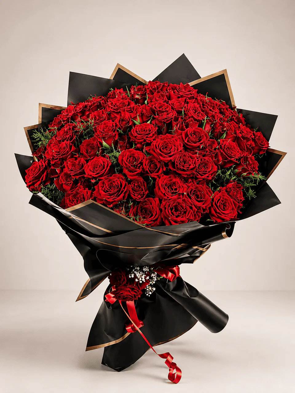 Royale red rose bouquet with black and gold wrapping in Casablanca